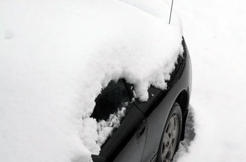 Rust Proofed Car covered in snow 